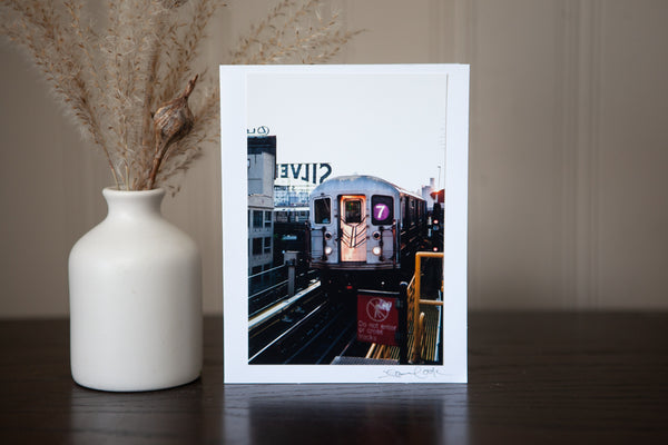 photo greeting card featuring an iconic new york city view the 7 line subway coming out of manhattan into brooklin - photograph created by laura cook of vision photography