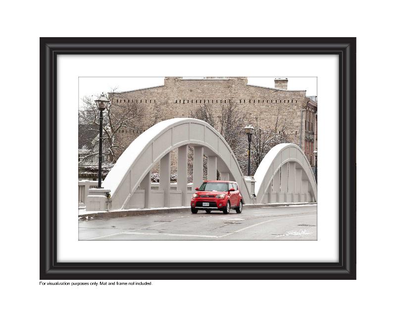 'Cambridge Soul' Photograph of Main Street Bridge in Galt, Cambridge in the winter with a red kia driving over the bridge photograph by Cambridge photographer Laura Cook 