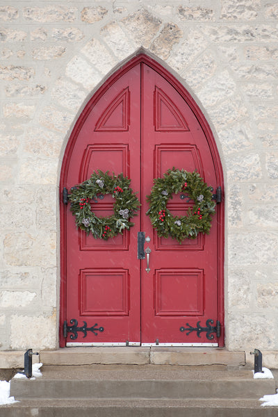 Red Door with Christmas Wreaths in snowfall Photo by Cambridge Ontario Photographer Laura Cook of Vision Photography