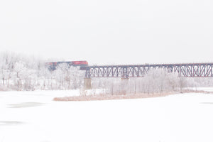 CP Train crossing train Bridge by GCI in Cambridge in the winter Photo by Cambridge Ontario Photographer Laura Cook of Vision Photography 