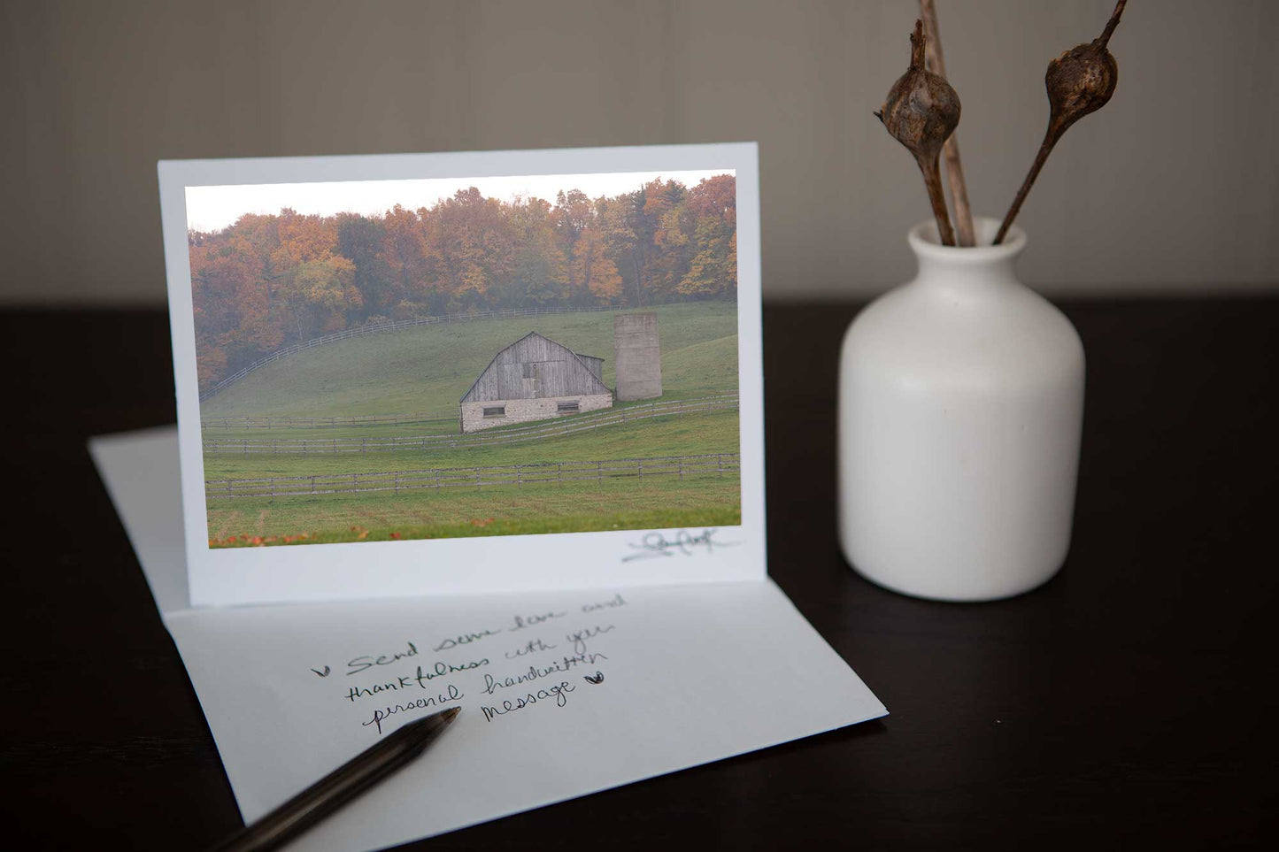 Photo greeting card featuring ' Misty Barn' a fall photograph of a charming barn set in the rolling hills with the autumn colours in the background on a misty day Photo by Cambridge Ontario Photographer Laura Cook of Vision Photography