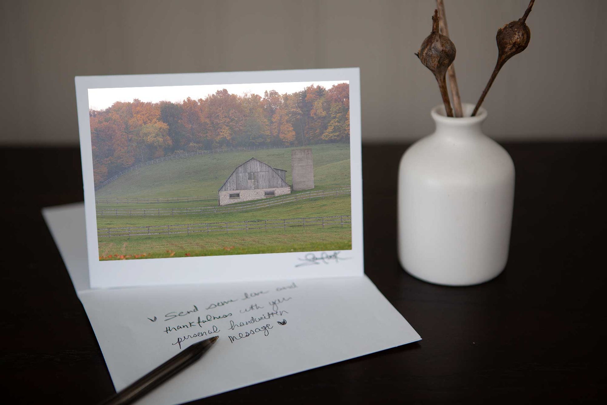 Photo greeting card featuring ' Misty Barn' a fall photograph of a charming barn set in the rolling hills with the autumn colours in the background on a misty day Photo by Cambridge Ontario Photographer Laura Cook of Vision Photography